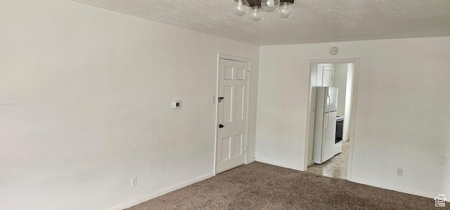 40 W 400 N Unit 1-6, Spanish Fork, UT 84660 - unfurnished room with light carpet and a textured ceiling