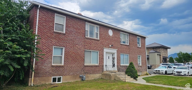 40 W 400 N Unit 1-6, Spanish Fork, UT 84660 - colonial-style house featuring brick siding and a front yard
