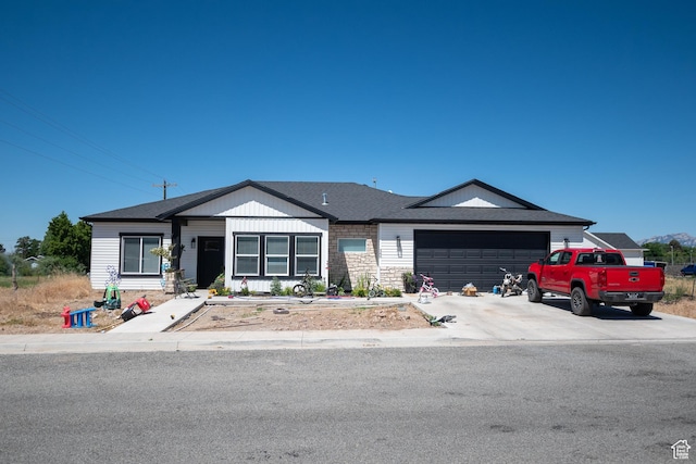 365 N 800 E, Beaver, UT 84713 - single story home featuring an attached garage, driveway, stone siding, and a shingled roof