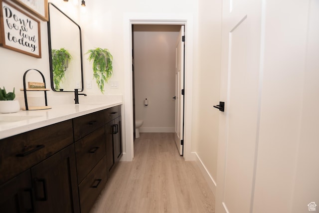 365 N 800 E, Beaver, UT 84713 - full bathroom with wood finished floors and double vanity