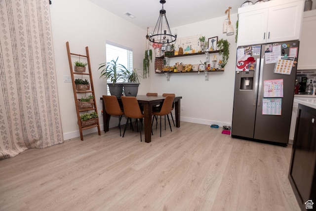 365 N 800 E, Beaver, UT 84713 - dining area with light wood-style flooring and a chandelier