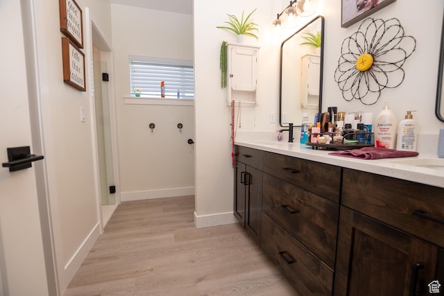365 N 800 E, Beaver, UT 84713 - bathroom with wood finished floors and double vanity