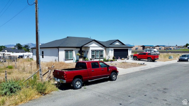 365 N 800 E, Beaver, UT 84713 - ranch-style house featuring an attached garage, driveway, and a mountain view
