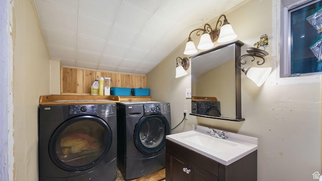 180 N State St, Sigurd, UT 84657 - laundry room with washing machine and dryer and wooden walls