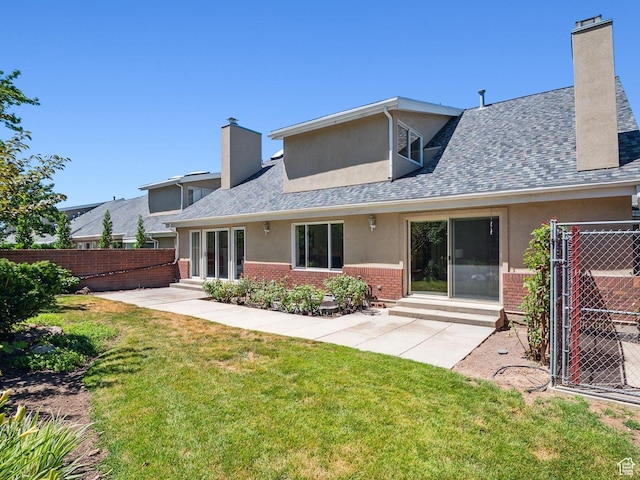 2056 E Sierra View Cir, Millcreek, UT 84109 - back of house featuring brick siding, entry steps, and stucco siding