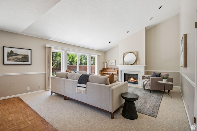 2056 E Sierra View Cir, Millcreek, UT 84109 - living room with lofted ceiling, a premium fireplace, and carpet