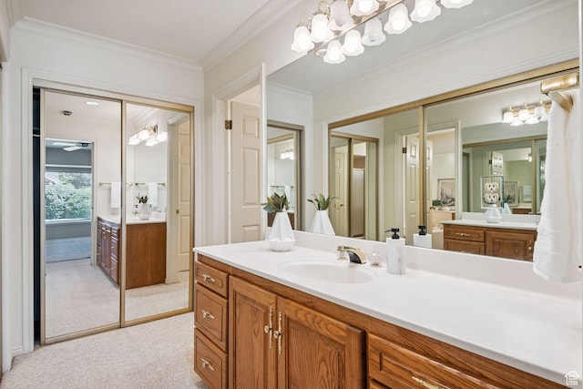 2056 E Sierra View Cir, Millcreek, UT 84109 - bathroom with vanity, ornamental molding, and a chandelier