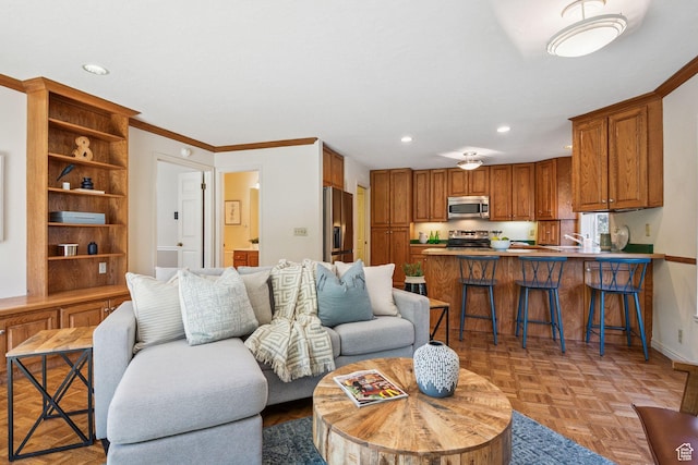 2056 E Sierra View Cir, Millcreek, UT 84109 - living area with recessed lighting and ornamental molding