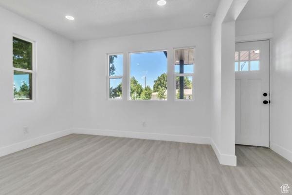 9593 S 700 E, Sandy, UT 84070 - unfurnished room featuring light wood finished floors and recessed lighting