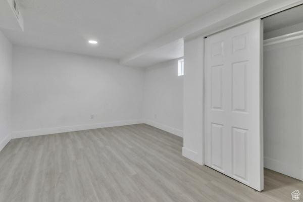 9593 S 700 E, Sandy, UT 84070 - below grade area featuring light wood finished floors and recessed lighting