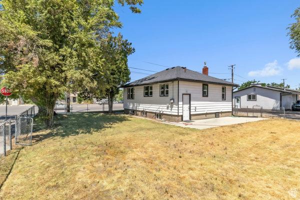 9593 S 700 E, Sandy, UT 84070 - back of property with a patio area