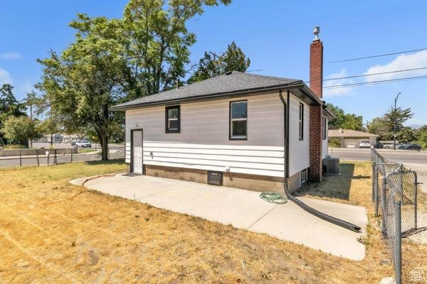 9593 S 700 E, Sandy, UT 84070 - view of side of property with a chimney