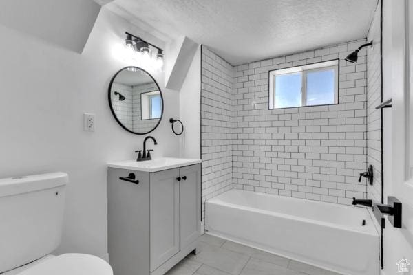 9593 S 700 E, Sandy, UT 84070 - bathroom featuring vanity, bathing tub / shower combination, a textured ceiling, and tile patterned floors