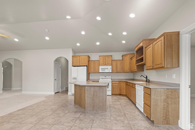 4713 W 4050 S, West Haven, UT 84401 - kitchen featuring white appliances, arched walkways, a kitchen island, light countertops, and open shelves