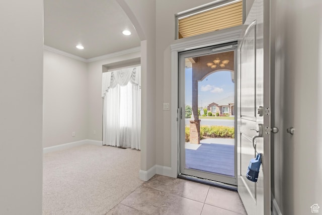 4713 W 4050 S, West Haven, UT 84401 - entrance foyer with arched walkways, ornamental molding, light colored carpet, light tile patterned floors, and recessed lighting