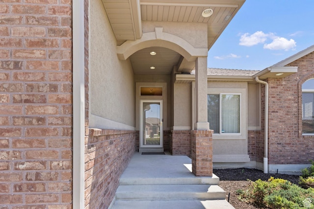 4713 W 4050 S, West Haven, UT 84401 - doorway to property featuring brick siding and stucco siding
