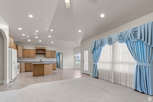 4713 W 4050 S, West Haven, UT 84401 - kitchen featuring open shelves, white fridge with ice dispenser, a center island, light tile patterned floors, and light colored carpet