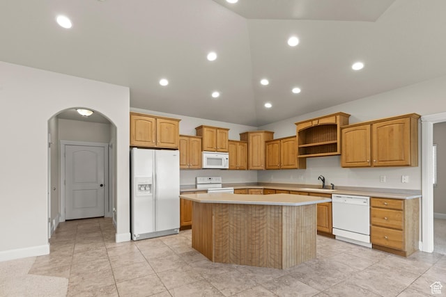 4713 W 4050 S, West Haven, UT 84401 - kitchen featuring white appliances, a kitchen island, light countertops, arched walkways, and open shelves
