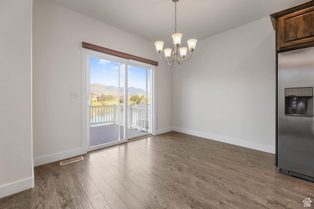 947 S 2040 W, Orem, UT 84059 - unfurnished dining area with wood finished floors, a chandelier, and a water view