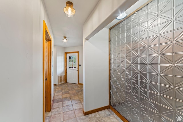 16 N Porcupine Ln, La Sal, UT 84530 - hallway featuring baseboards and stone finish floors