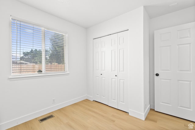 1215 W 125 S, Lehi, UT 84043 - unfurnished bedroom featuring light wood finished floors and a closet