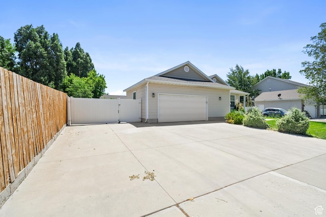 1215 W 125 S, Lehi, UT 84043 - view of front of house with driveway, a gate, and an attached garage