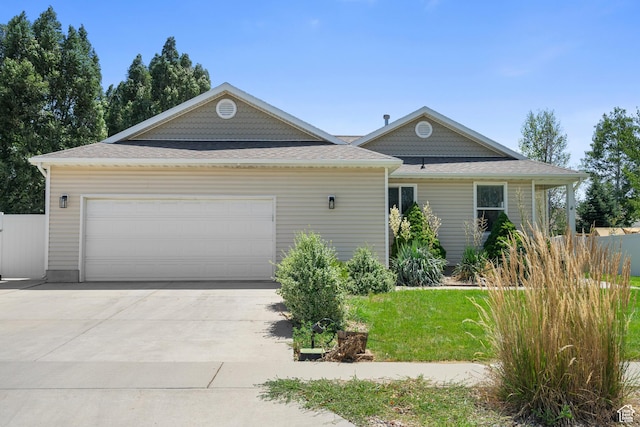 1215 W 125 S, Lehi, UT 84043 - view of front of house with concrete driveway, an attached garage, and a shingled roof