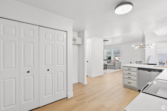 1215 W 125 S, Lehi, UT 84043 - kitchen featuring stainless steel dishwasher, light wood-style floors, a chandelier, open floor plan, and light countertops