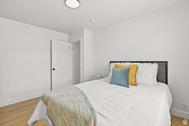 1215 W 125 S, Lehi, UT 84043 - bedroom featuring baseboards and wood finished floors