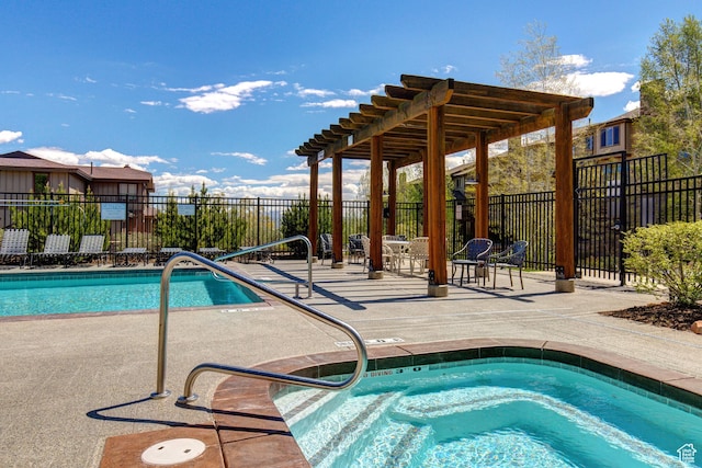 5541 N Slalom Way, Park City, UT 84098 - view of swimming pool with a patio, a hot tub, and a pergola