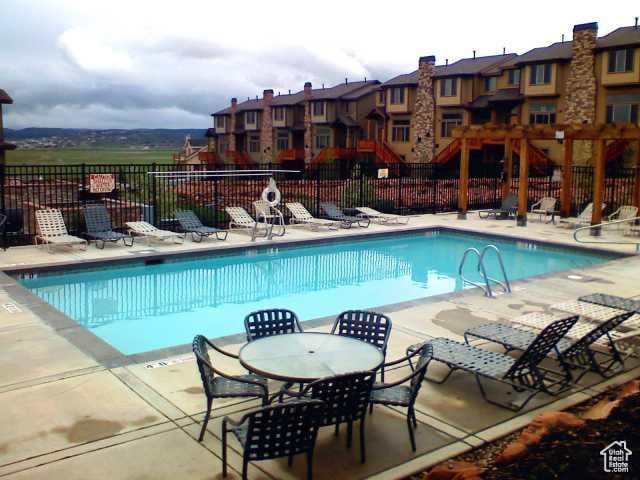 5541 N Slalom Way, Park City, UT 84098 - community pool with a patio and a residential view