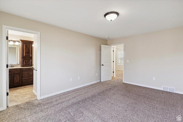 5464 S 3200 W, Roy, UT 84067 - unfurnished bedroom featuring light colored carpet and ensuite bath