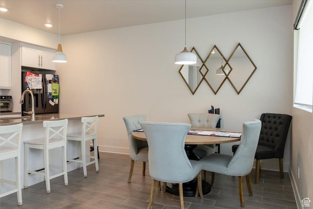 2049 N Harvest Village Ln, Saratoga Springs, UT 84045 - dining space with wood finished floors and recessed lighting