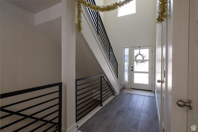 2049 N Harvest Village Ln, Saratoga Springs, UT 84045 - foyer featuring plenty of natural light, wood finished floors, and a towering ceiling