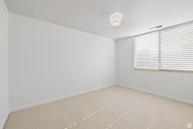 777 E S Temple Unit 4A, Salt Lake City, UT 84102 - carpeted empty room with baseboards