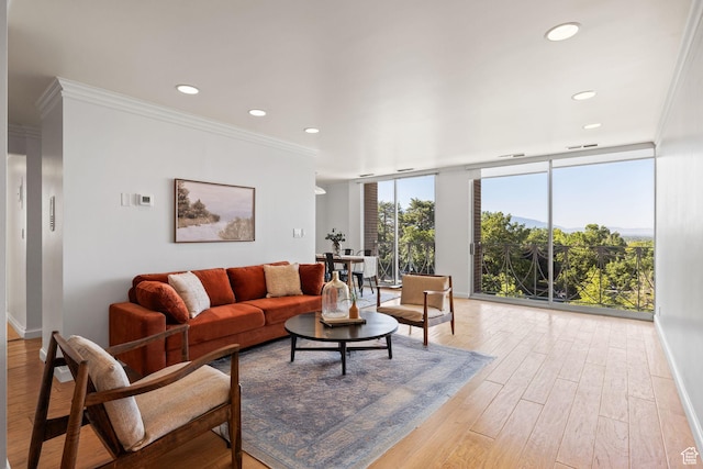 777 E S Temple Unit 4A, Salt Lake City, UT 84102 - living area featuring ornamental molding, light wood finished floors, recessed lighting, and floor to ceiling windows
