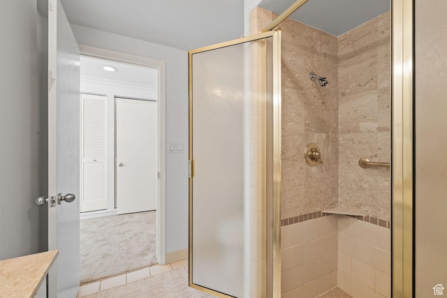 777 E S Temple Unit 4A, Salt Lake City, UT 84102 - bathroom featuring a stall shower, tile patterned floors, and vanity