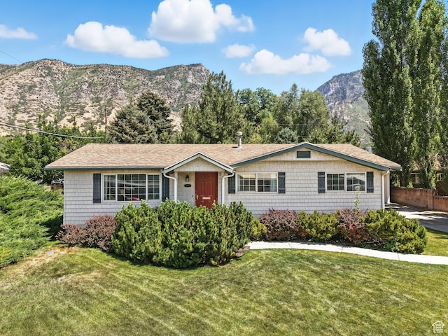 2844 Timpview, Provo, UT 84604 - ranch-style home featuring a front lawn, a mountain view, and roof with shingles
