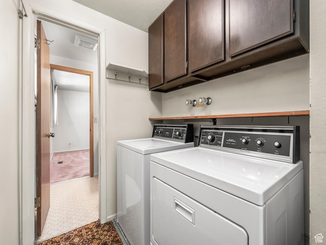 2844 Timpview, Provo, UT 84604 - laundry room with cabinet space, washer and clothes dryer, and dark floors
