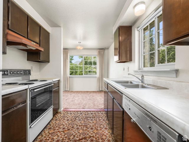 2844 Timpview, Provo, UT 84604 - kitchen with electric range, under cabinet range hood, dishwasher, and light countertops