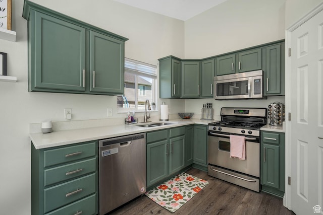 224 W Apple Ave, Saratoga Springs, UT 84045 - kitchen with appliances with stainless steel finishes, green cabinetry, light countertops, and dark wood-type flooring