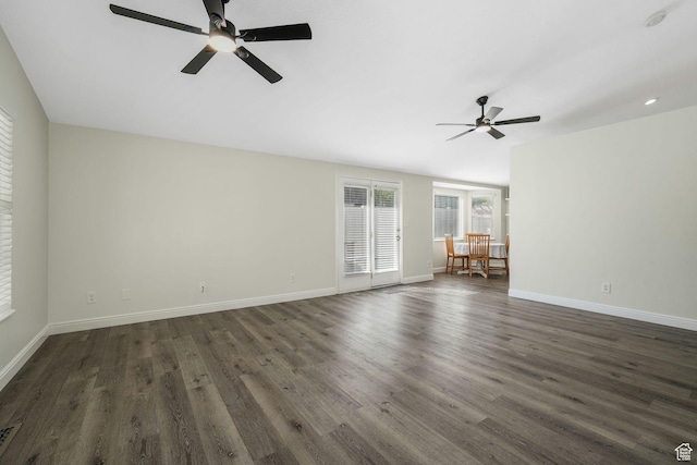 224 W Apple Ave, Saratoga Springs, UT 84045 - unfurnished living room featuring a ceiling fan and dark wood-style floors