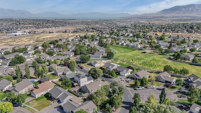 224 W Apple Ave, Saratoga Springs, UT 84045 - aerial view of property's location featuring a mountainous background and nearby suburban area
