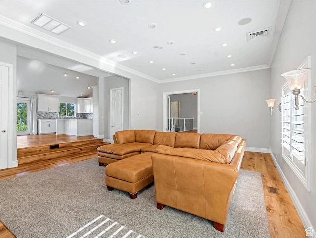 2960 E Oak Park Ln S, Holladay, UT 84117 - living room featuring light wood-style floors, recessed lighting, and crown molding