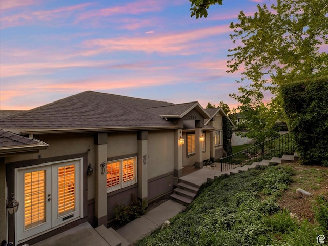 2960 E Oak Park Ln S, Holladay, UT 84117 - view of front of house with roof with shingles, stucco siding, and french doors