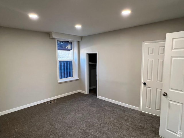9173 S 1300 W, West Jordan, UT 84088 - unfurnished bedroom with dark carpet, recessed lighting, and a closet