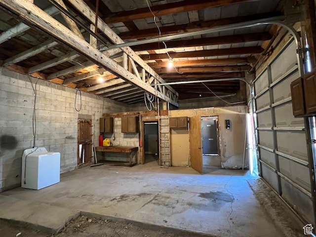 9173 S 1300 W, West Jordan, UT 84088 - garage featuring washer / clothes dryer and concrete block wall