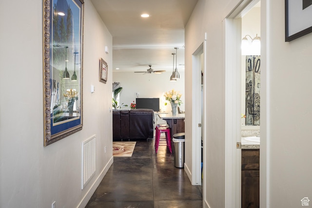 1018 S Valley View Ct, Moab, UT 84532 - corridor featuring finished concrete flooring and recessed lighting