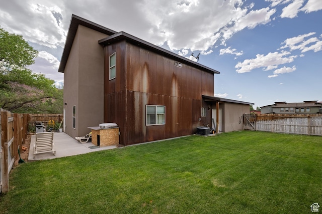 1018 S Valley View Ct, Moab, UT 84532 - rear view of property with a patio area and a fenced backyard
