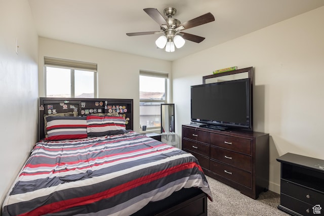 1018 S Valley View Ct, Moab, UT 84532 - bedroom featuring carpet and ceiling fan